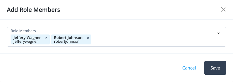 Screen capture of the Add role members modal displaying a searchable list of users with checkboxes for selection and a Save button.